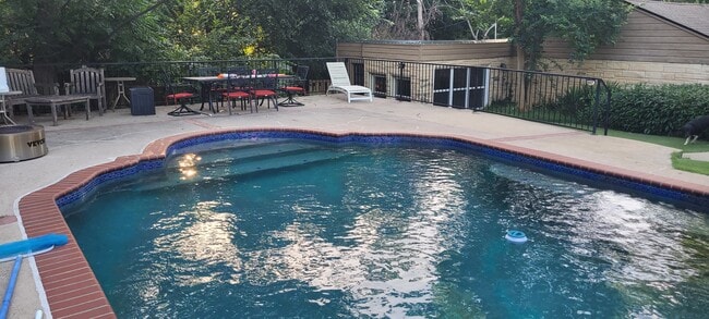 View of back entrance from pool - 125 Woodland Dr Unidad B