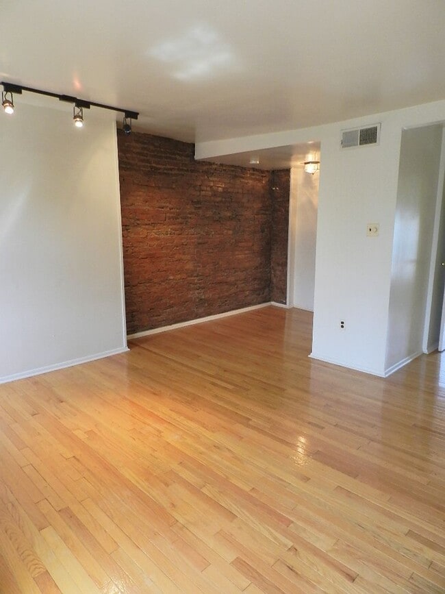 Photo - Spacious Bi-Level 2 Bedroom, 2 Bathroom with Exposed Brick & In-Unit Laundry Unit #2R