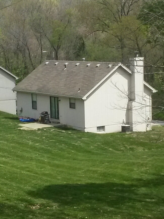 Management mows the lawn - 3242 N Virginia Ave