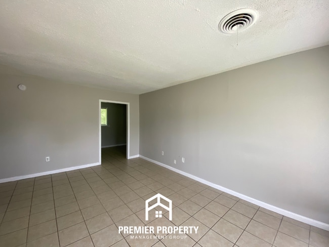 Photo - Spacious 4BR Family Home in Raleigh | Modern Tile Floors & Spacious Backyard