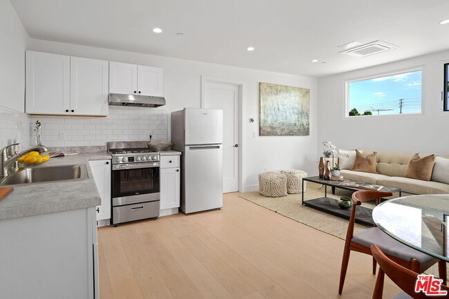 Building Photo - 4145 Tilden Ave Unit #A