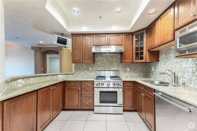 Building Photo - 10618 Woodbridge St Unit 307 Rental