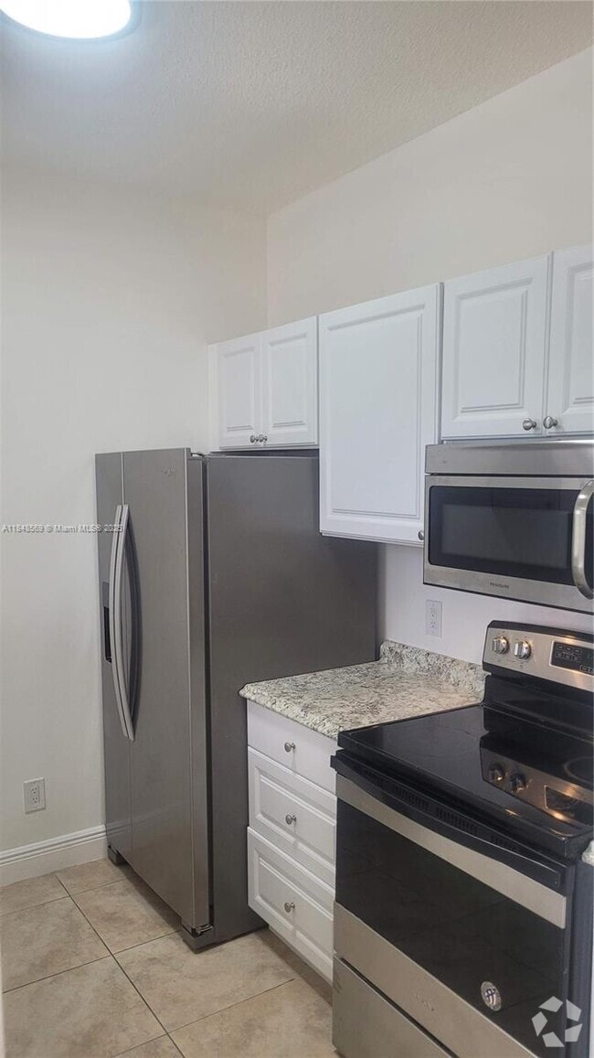Building Photo - 660 Cypress Club Way Unit H11 Rental