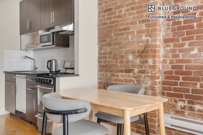 Photo - 515 W 47th St Unidad SI FL4-ID1989