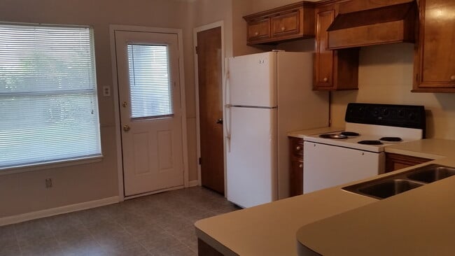 Photo - The right side unit of this duplex offers a comfortable and functional layout ideal for small fam...
