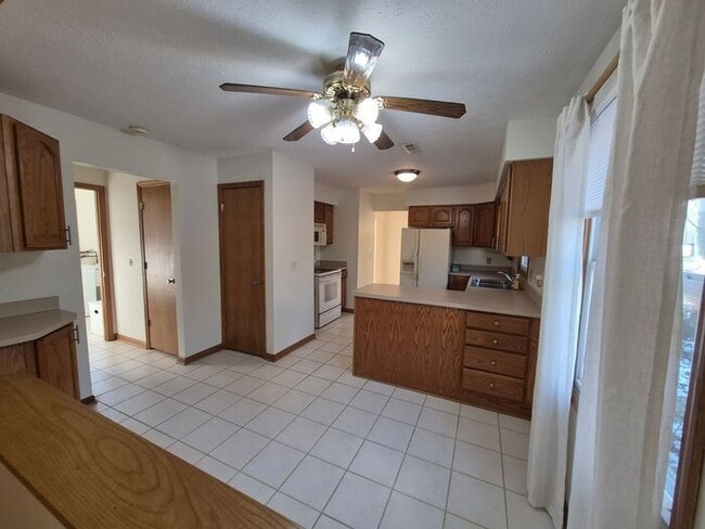 Photo - Charming 3BR 1.5BA Home w/ In-Unit Laundry + Central Air + Garage in Avon