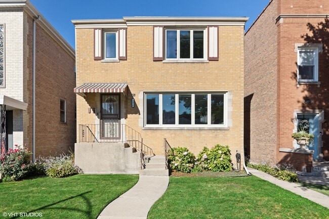 Building Photo - 5016 N Mango Ave Unit 2