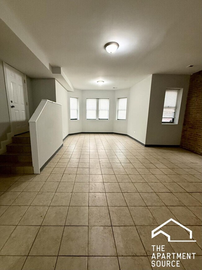 Building Photo - 6917 S Paxton Ave Unit G