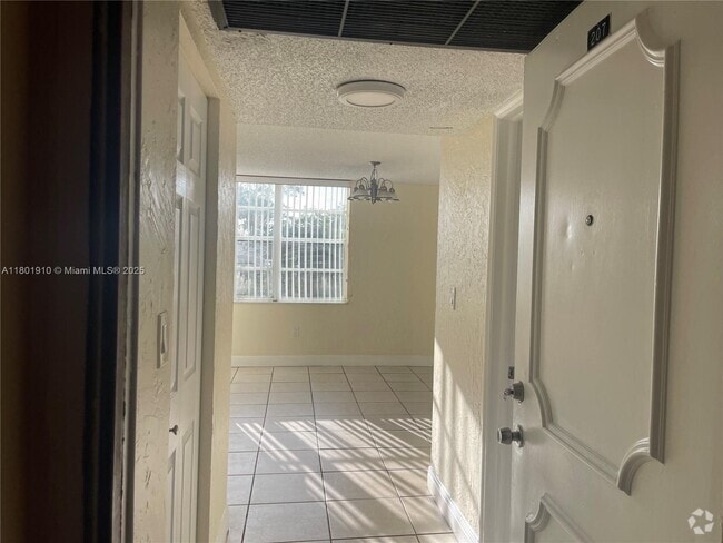 Building Photo - 9495 Evergreen Pl Unit 207 Rental