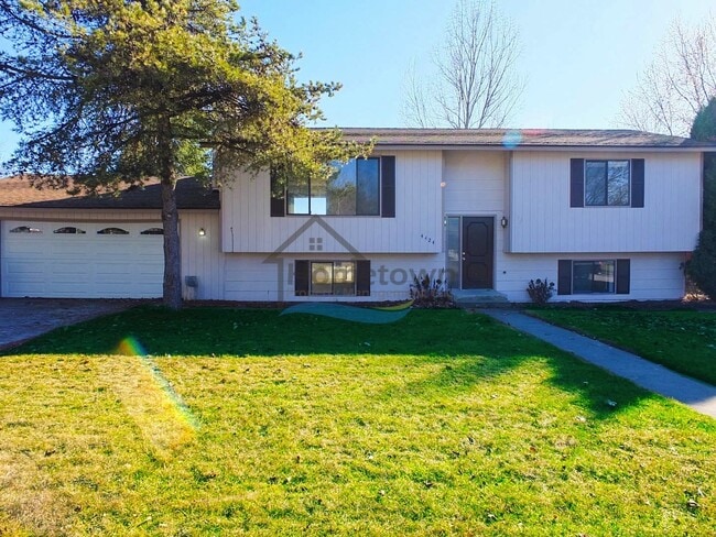 Photo - Spacious 4 Bedroom Home with Fenced Backyard & Garage