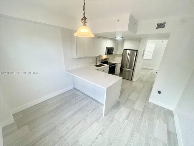 Building Photo - 77 E 4th St Unit A212