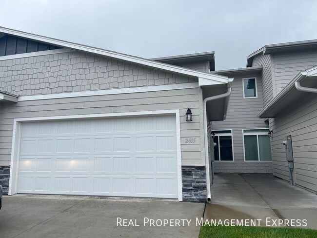 Photo - Modern Luxury: 3BR Townhome with Stylish F...