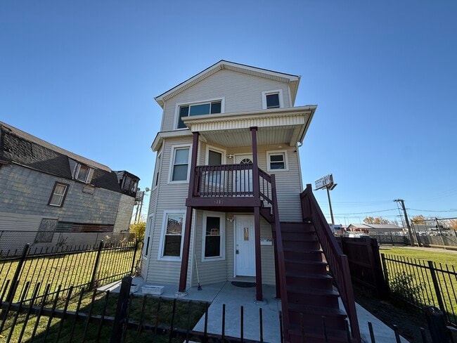 Building Photo - 5113 W Lexington St Unit 1