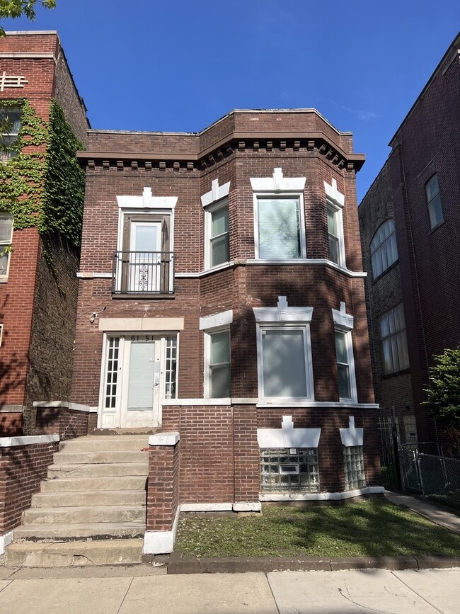 Building Photo - 6151 S Langley Ave