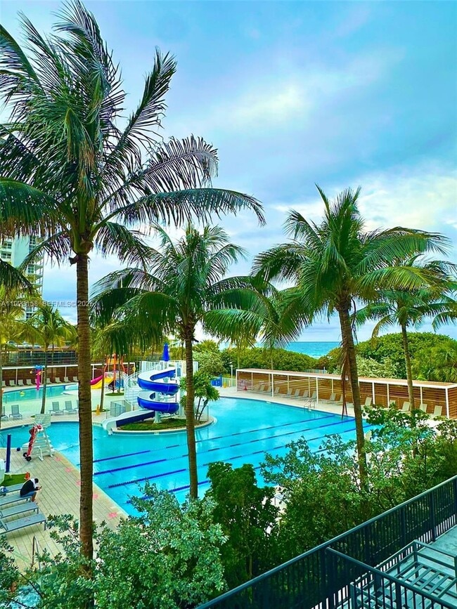 Building Photo - 9273 Collins Ave Unit 207