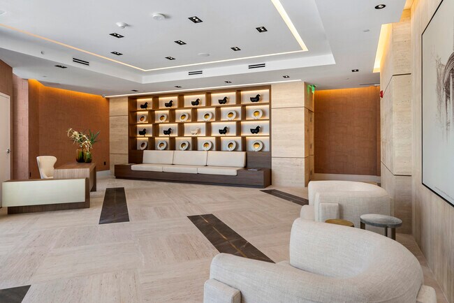 Private lobby featuring marble fountains and original artwork
