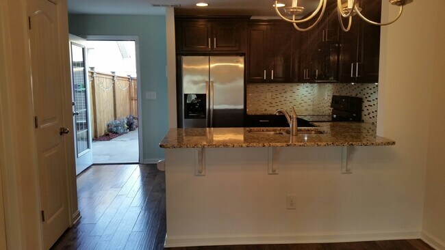 Photo - Townhome in Villages of Riverwood, Upgrades include Granite, Hdwd Floors, 1 Car Garage, Community...