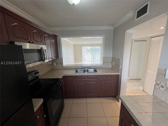 Photo - 8560 N Sherman Cir Unit 308