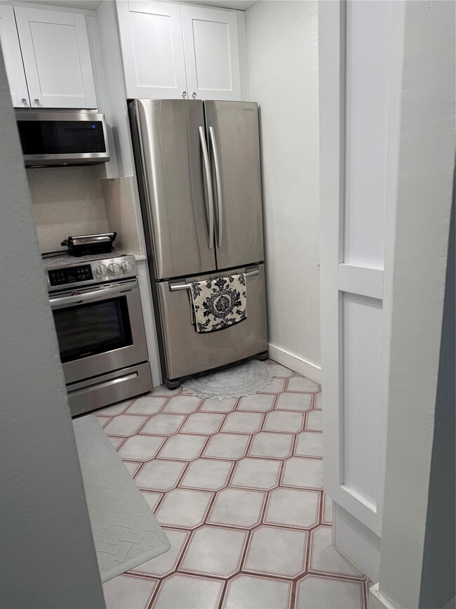 Photo - 9360 Lime Bay Blvd Unit 202