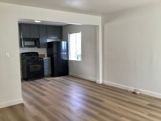 Photo - 2BD 1BA Apt Next to USD - Spacious Upstairs Unit, Pet Friendly, 1 Parking Space, No Carpet Unit 5836
