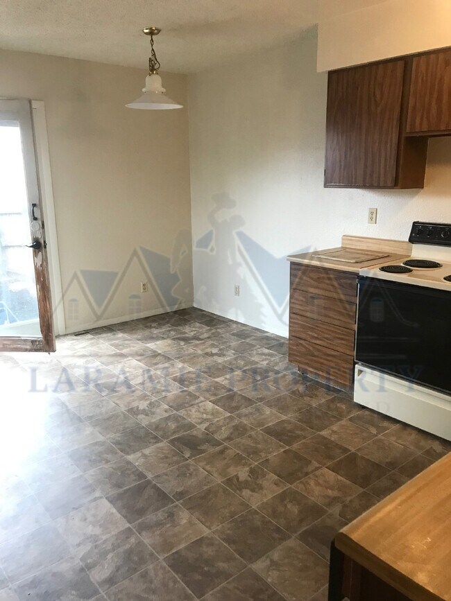 3-Bedroom Townhome with Fenced Yard & Detached Garage