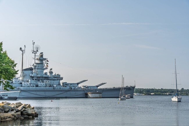 Battleship Cove — tour historic naval ships and soak in river views about 12 minutes away.