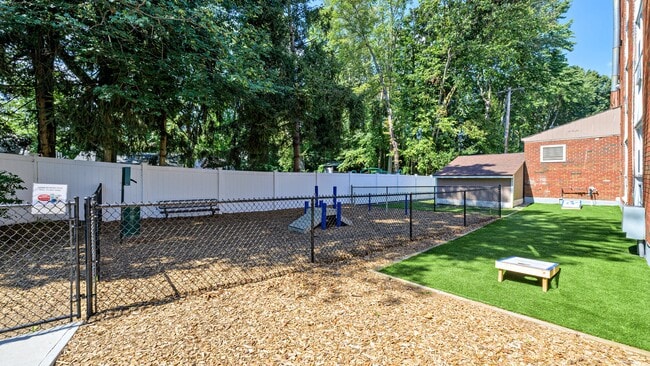 Bring your pup down to our off-leash dog park for some fun or play a game of cornhole.
