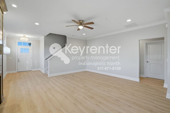 Photo - Located in Westfield, IN, this attractive 3-bedroom, 2.5-bath home sits on a corner lot within an...