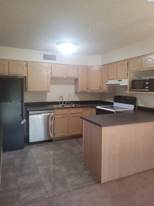 Photo - 303 Gage Blvd Unit 104