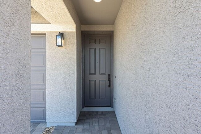Photo - Modern Mountainside Living: Stunning 4-Bedroom Home in Estrella Crossing! 3 CAR GARAGE!