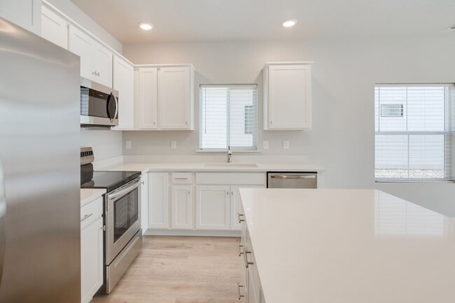 Photo - This gorgeous 3 bedroom, 2.5 bath townhome is 1440 square feet of HOME!