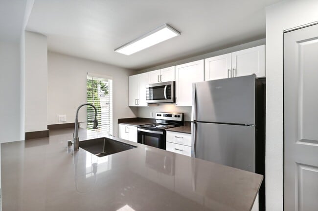 Photo - Charter Club Apartments