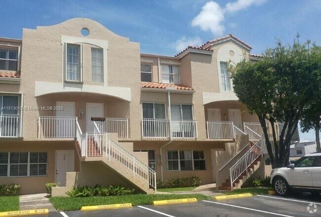 Building Photo - 8695 NW 6th Ln Unit 2-201 Rental
