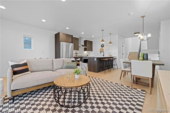 Building Photo - Modern 3-Story Townhomes with Private Yard...