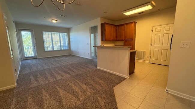 Photo - 2BR 4th Floor Condo Near St. Johns Town Center. Gated Community. Balcony & Elevator Access! Unit 3402