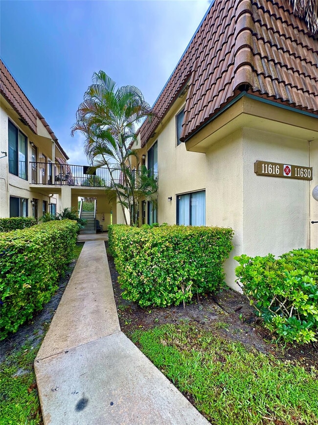 Building Photo - 11622 Royal Palm Blvd Unit 11622