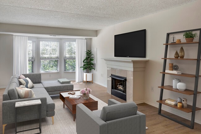 Renovated Package III living area with hard surface plank flooring