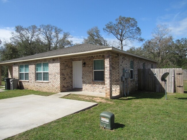 Photo - West Pensacola Duplex Living — 3BR Home with Open Floor Plan, Eat-In Kitchen, Covered Patio & Low... Unit C