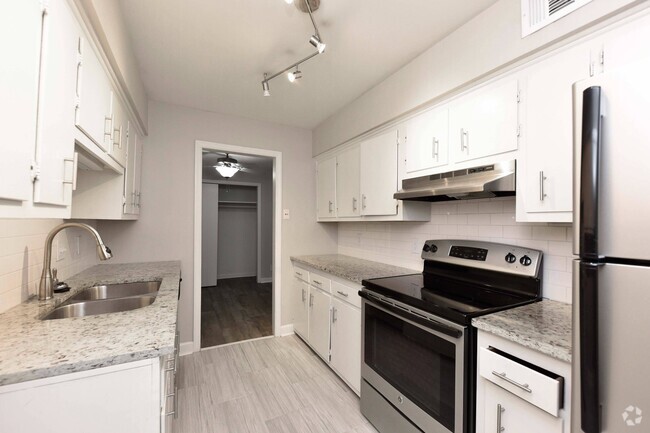 Kitchen with Backsplash + Modern Cabinetry - Greenbriar Rental