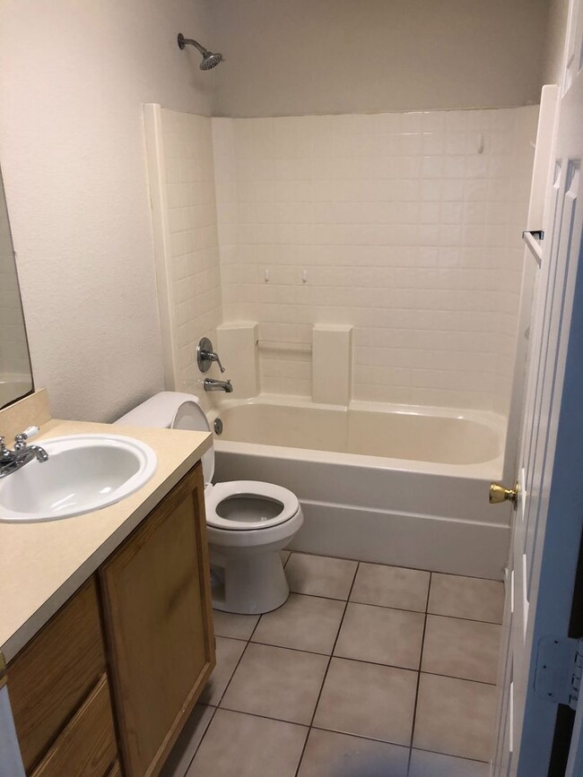 Photo - Full Brick 3 bed 2 bath 2 car Garage with fenced back yard! All new paint, Flooring, appliances!!