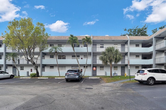 Building Photo - 8351 Sands Point Blvd Unit 104-A