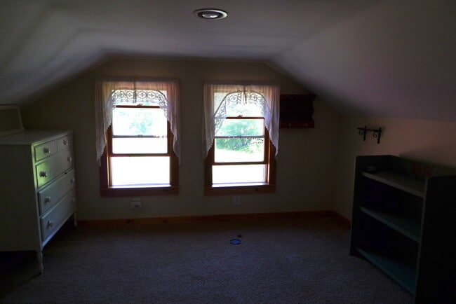 Photo - Charming Two-Bedroom Home in a Peaceful Wo...