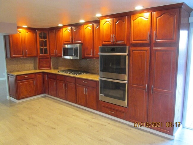 Photo - Remodeled !  Hardwood Flooring Throughout & New Carpet in Bedrooms, Tile, Granite, Large Living r...