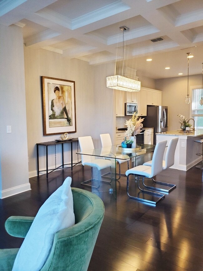 Living Room, Dining, and Kitchen - 618 Morning Glory Pl NE Townhome