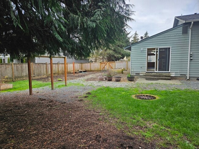 Back yard ready for planting - 10011 33rd Ave SE