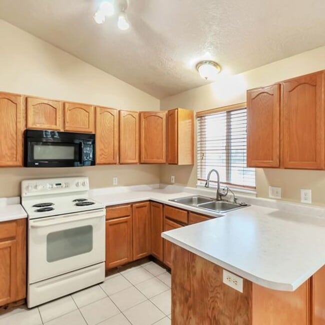 Photo - Awesome 4 Bedroom Pet Friendly Home w 2 car attached garage
