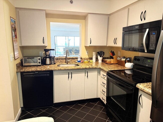 Building Photo - 7240 Huntington Ln Unit 704 Rental