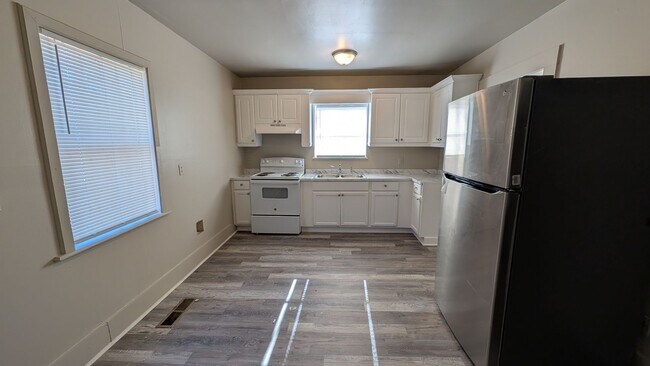 Photo - 3BR/1BA -- Deck, Separate Dining Room, In-Unit Laundry