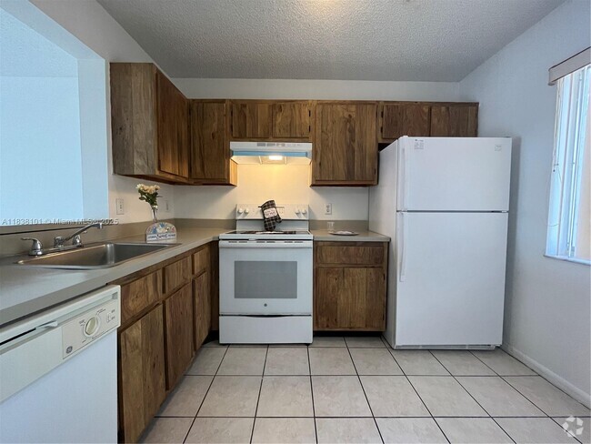 Building Photo - 8720 N Sherman Cir Unit 207 Rental
