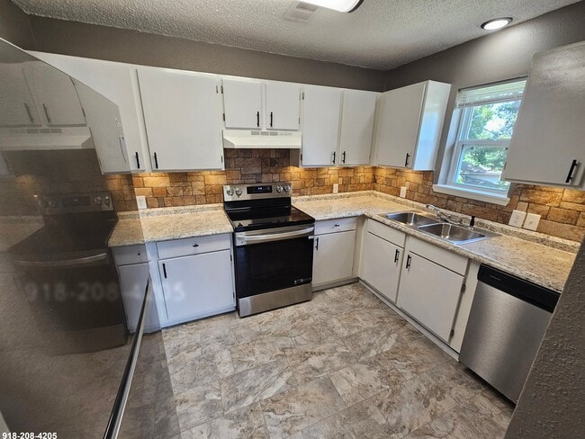 Photo - 1601 N Hills Blvd Unit 1603 N Hills Blvd